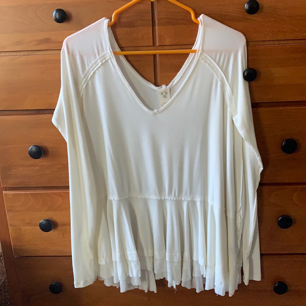 Free people peplum long sleeve tee. Size small. Rarely worn.